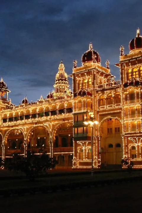 Mysore Palace lit up with thousands of lights at night
