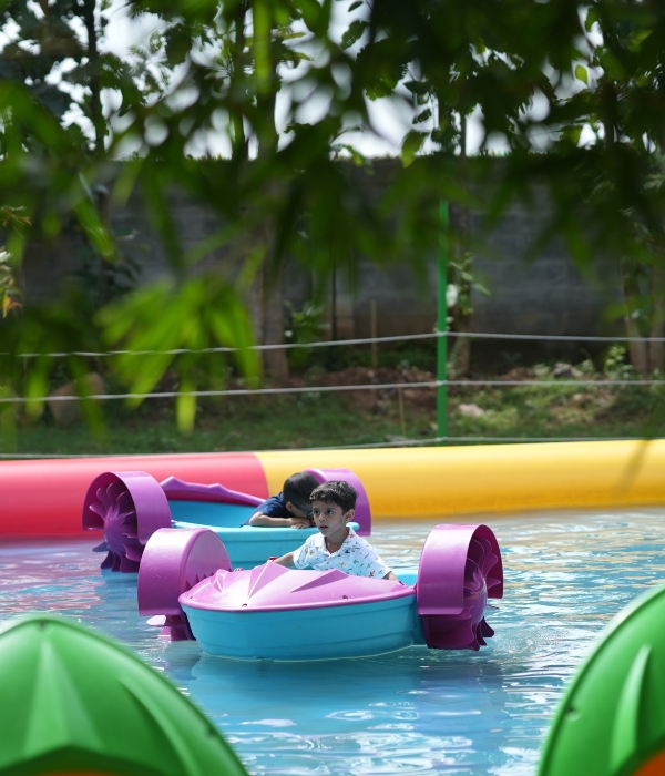 Kids boating at Suggee Resort, resort in Bangalore