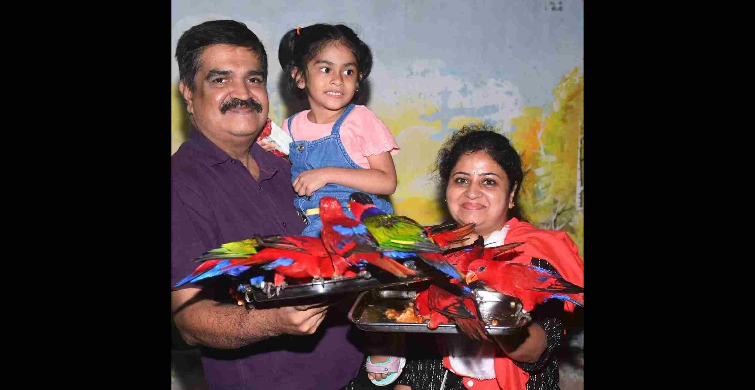 Families feeding birds at Shuka Vana Mysore