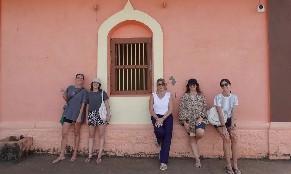 Travelers enjoying a group moment during their stay at Borrbo Gokarna