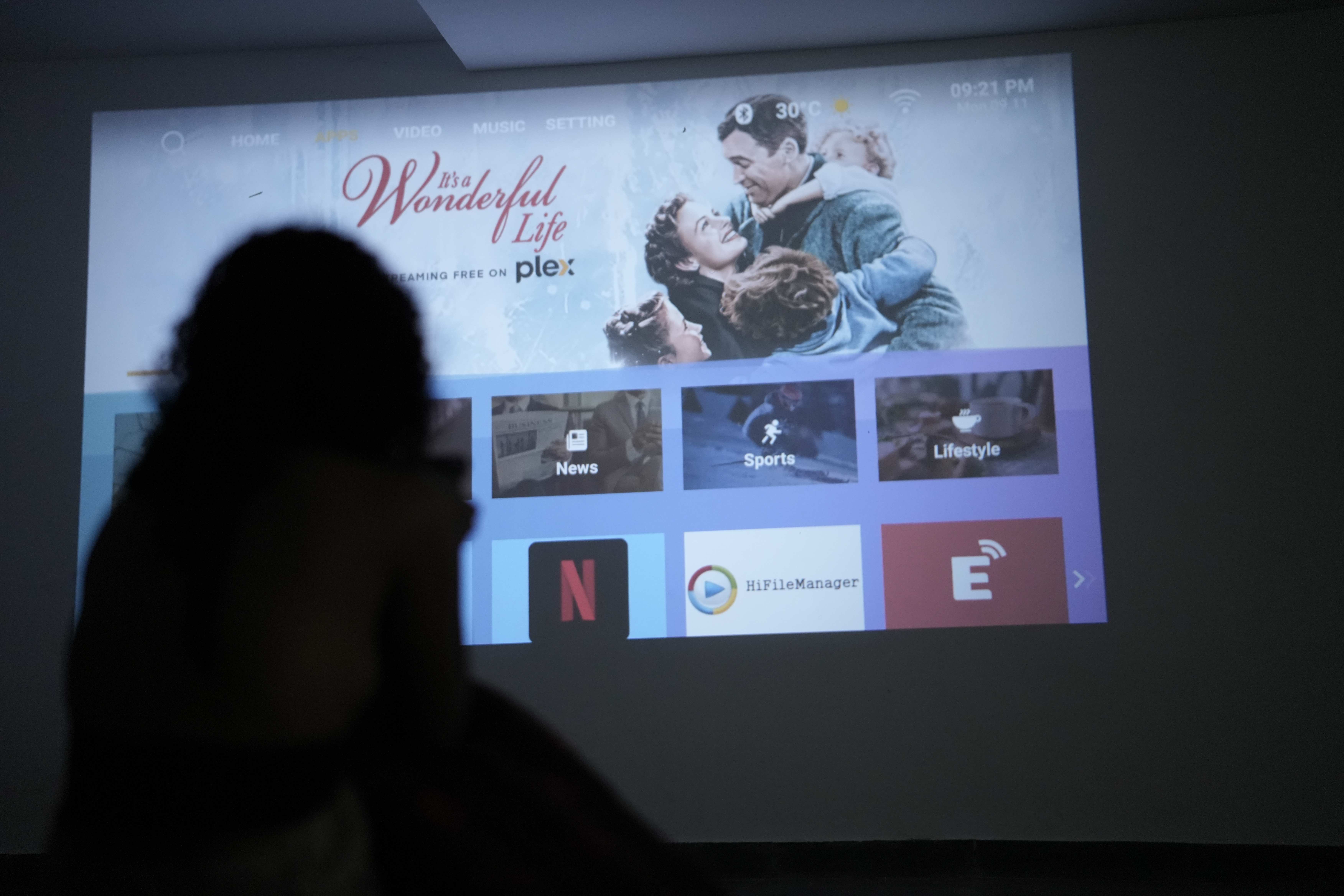 Guest watching movie at Borrbo Hostel
