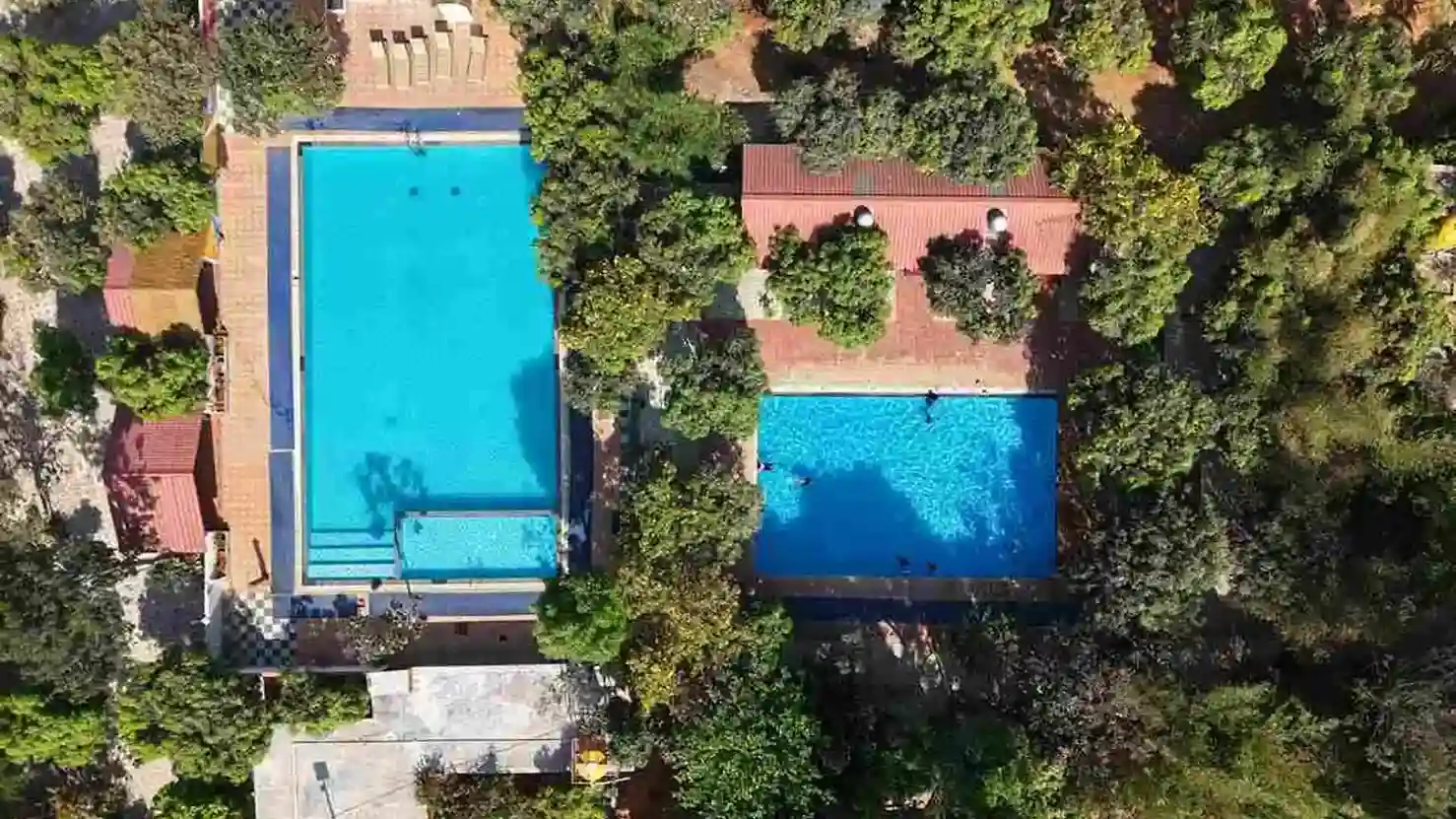 Swimming pool resort view at Suggee Resort Bangalore