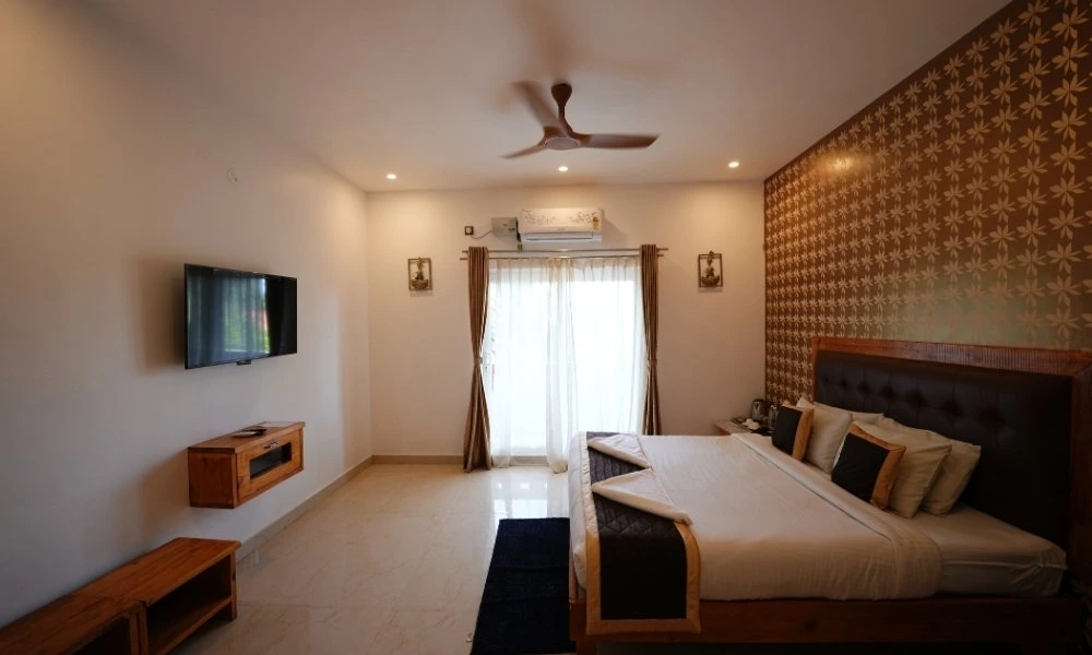 Nirvana balcony room sitting area at Suggee Resort
